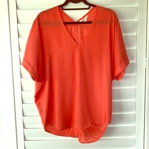 Bright orange flowy short sleeved blouse size L